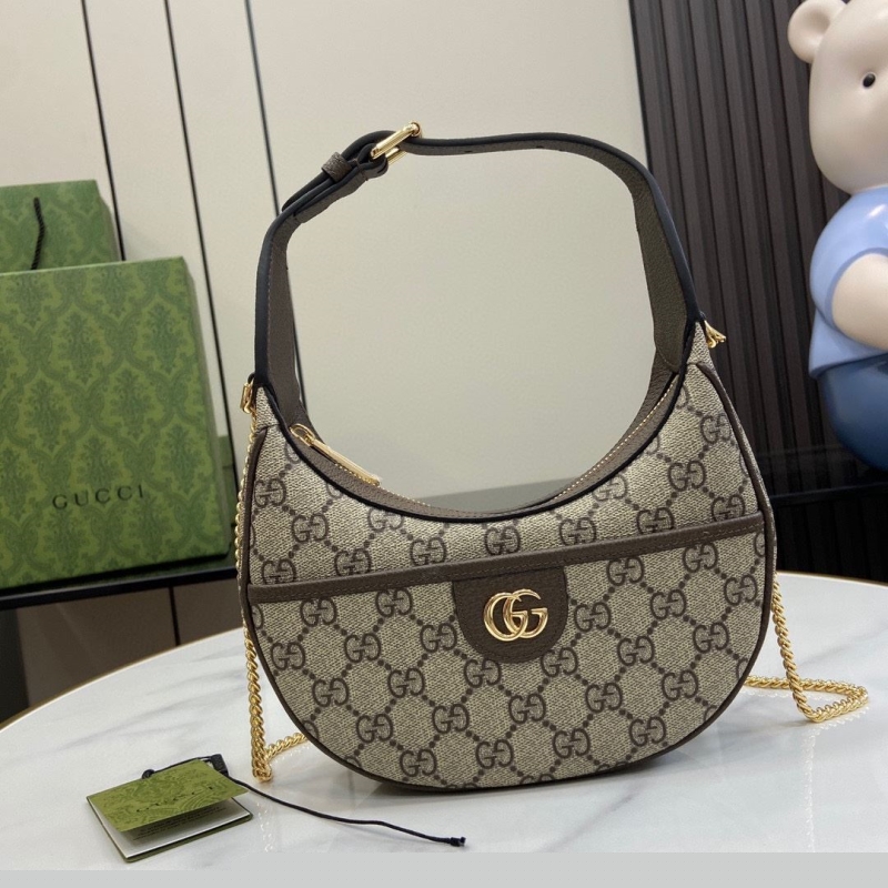 G*u*i top handle bags